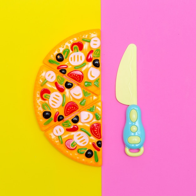 Photo toy plastic pizza. pizza lover flat lay art