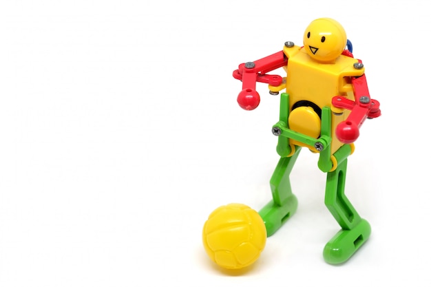 Foto toy robot stanno giocando a calcio, concetto di sport.