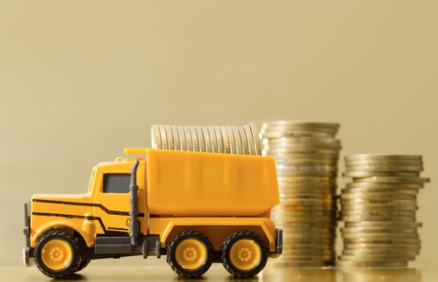 toy truck carrying with full of coins