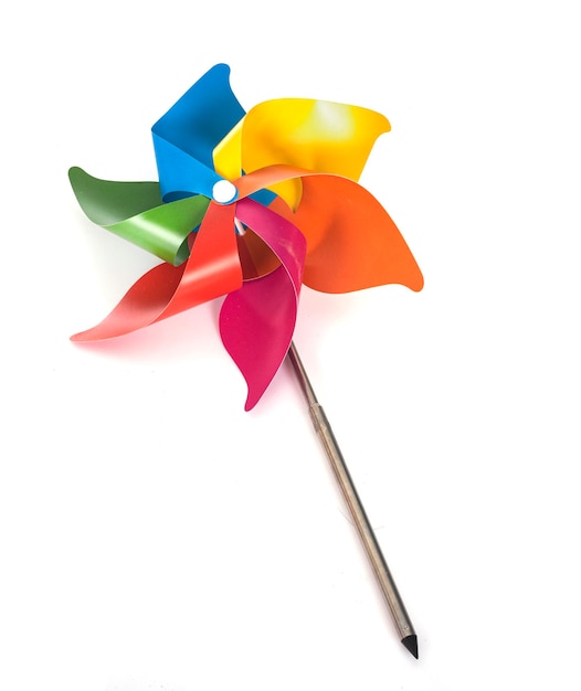 toy windmill in front of white background