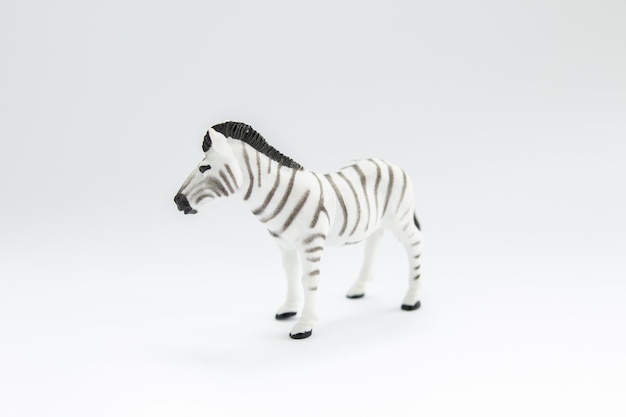 Toy zebra on a white background