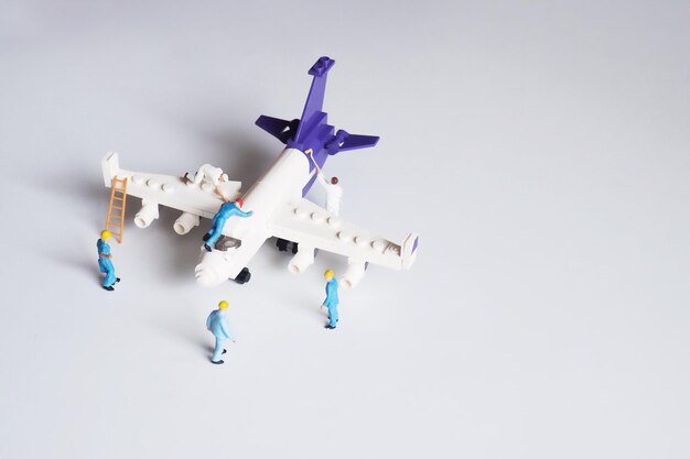 Photo toys on airplane over white background