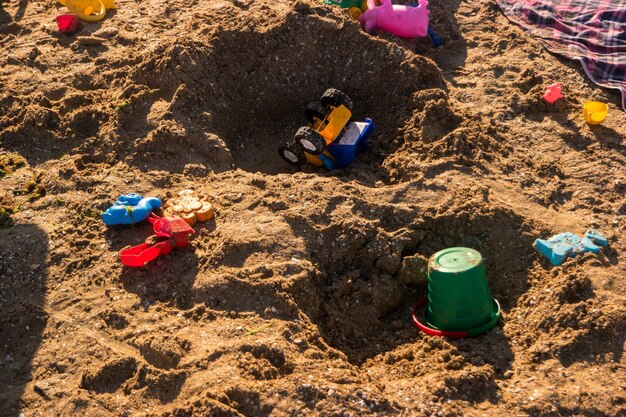 Toys on the beach toy truck and bucket build whatever you want imagine and create