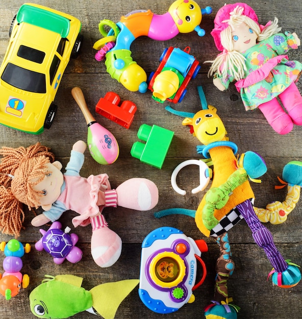 Toys collection on wooden background