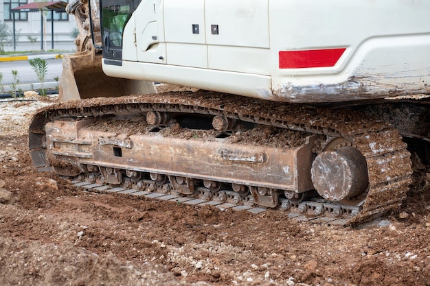 The tracks of a construction machine working in the mud Excavator pallet