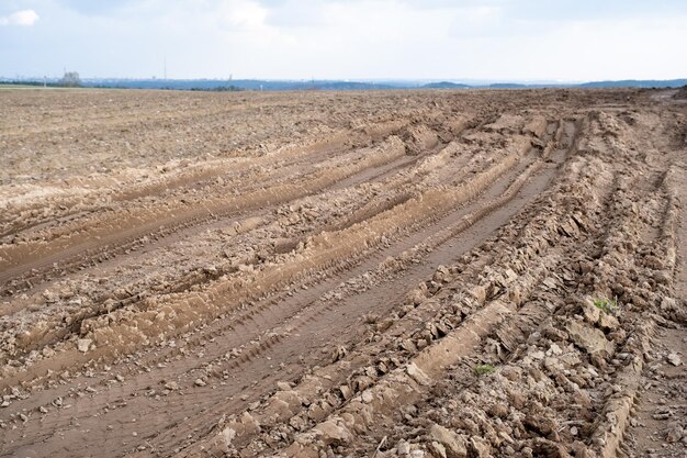 Tracks from vehicle wheels on the ground