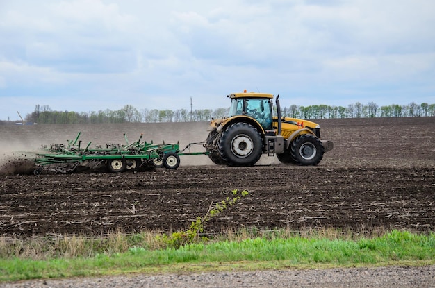 Tractor cultivating field