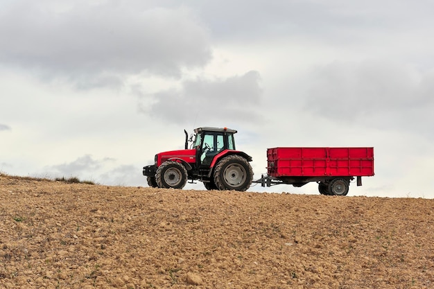 Tractor doing agricultural work in the field