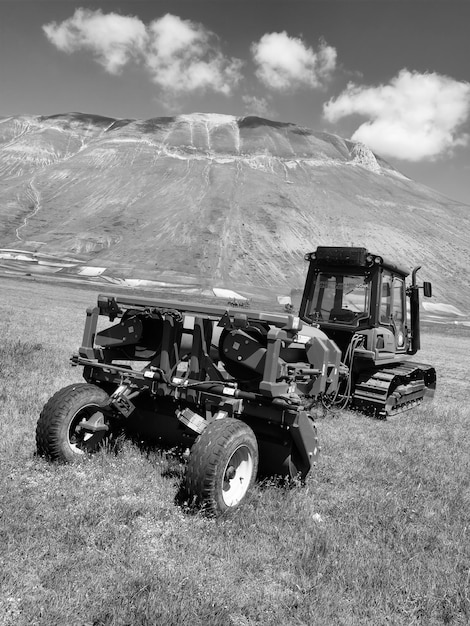 tractor on field against sky