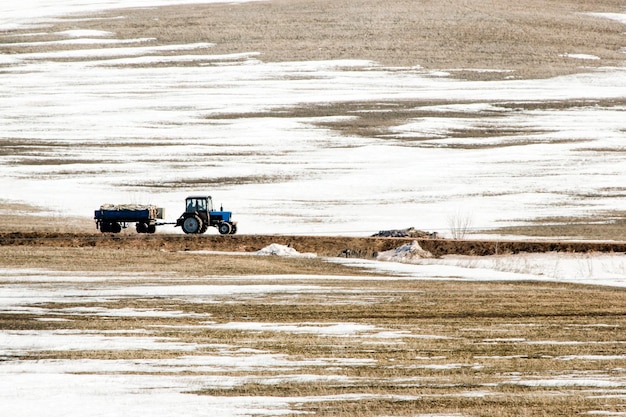 Tractor on snowy field