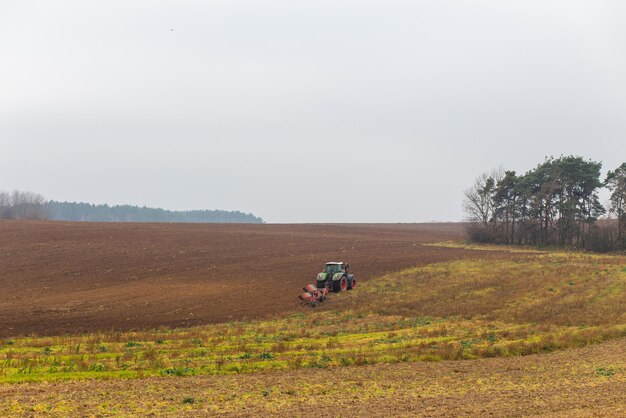 A tractor with a large double plow