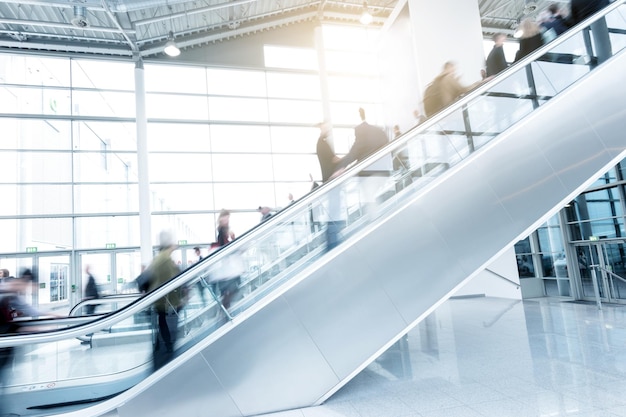 Trade fair staircase with blurred business people