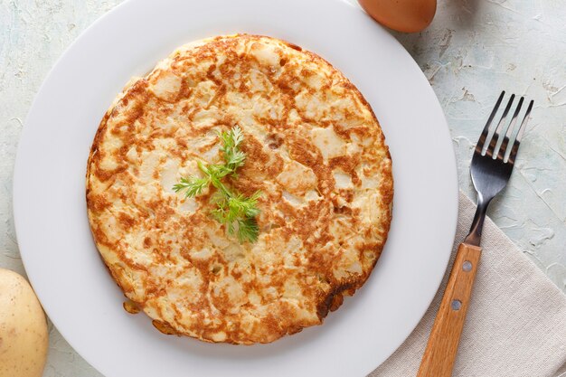 Tradiotional spanish omelette with parsley