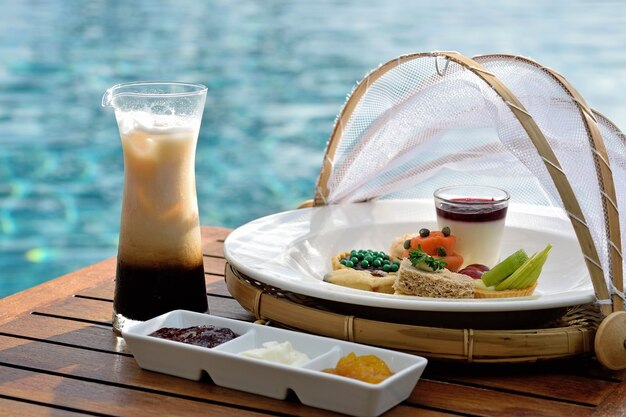 Traditional afternoon tea in the swimming pool