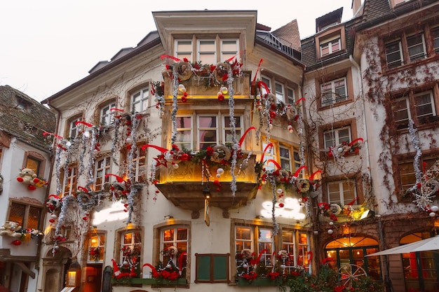 Traditional Alsatian halftimbered house in old town of Strasbourg decorated at christmas time Alsace France