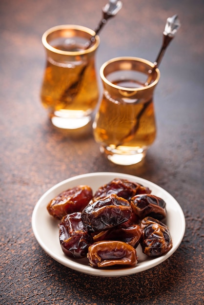 Traditional arabic tea and dry dates