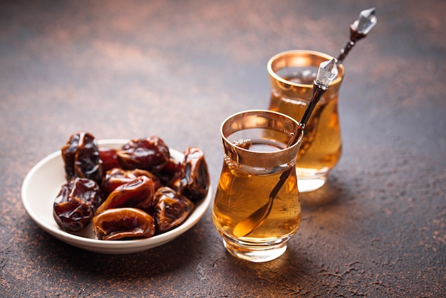 Traditional arabic tea and dry dates