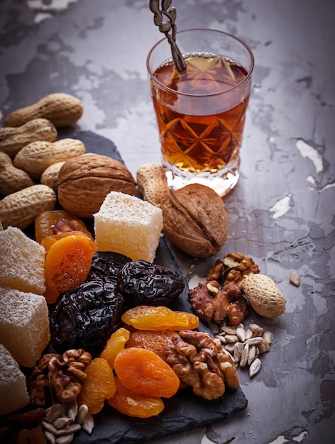 Traditional arabic tea and dry fruits and nuts