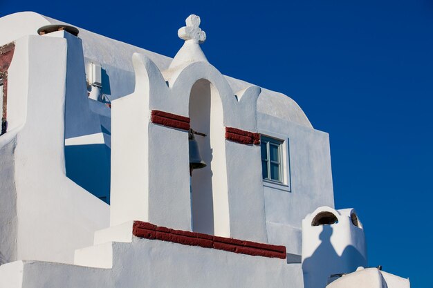 Traditional architecture of the churches of the oia city in santorini island