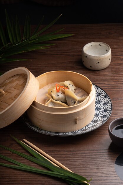 Traditional Asian food in a bowl. Hot dish dumpling