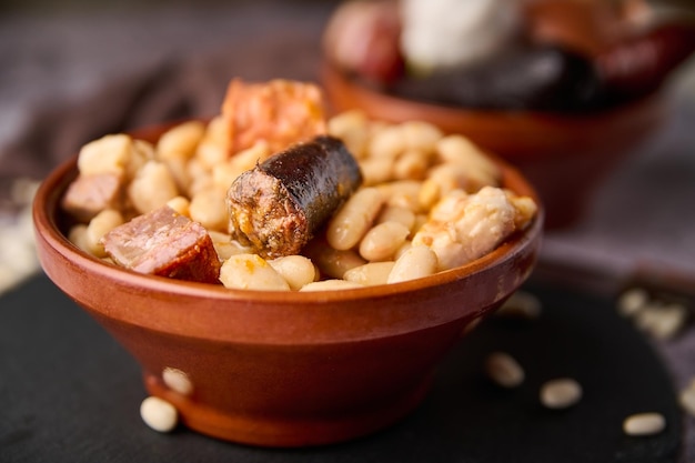 Traditional Asturian bean stew and its ingredients