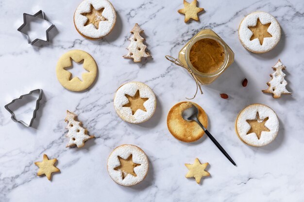 Traditional Austrian Christmas cookies Linzer Christmas or New Year cookies Top view flat lay