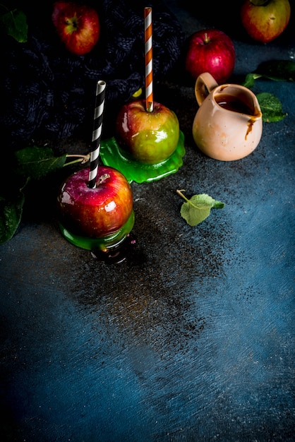 Traditional autumn delicacy, apples in caramel glaze