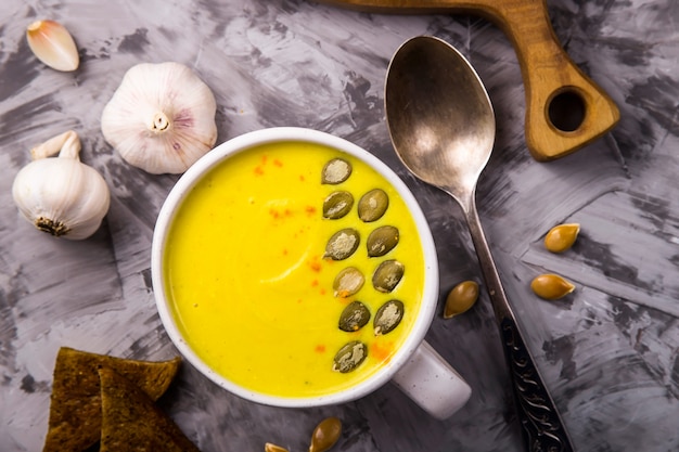 Traditional Autumn Pumpkin Dish - Soup with Spices and Garlic