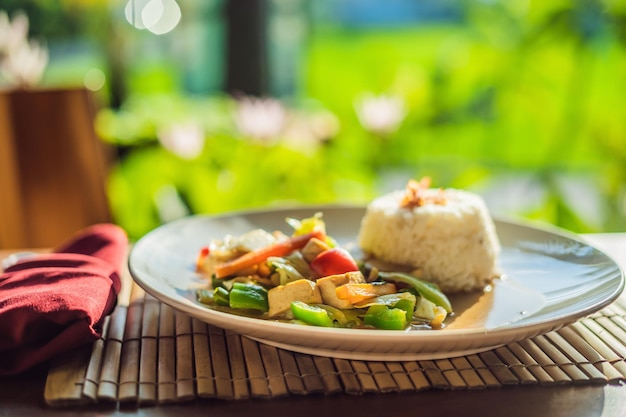 Traditional Balinese cuisine. Vegetable and tofu stir-fry with rice.