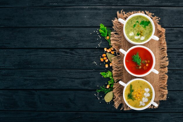 Traditional basil pesto sauce Basil parmesan cheese olive oil pine nuts pepper garlic Top view On the stone table Free space for text