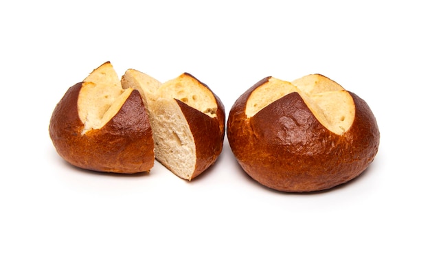 Traditional Bavarian pretzel roll bun isolated on white background