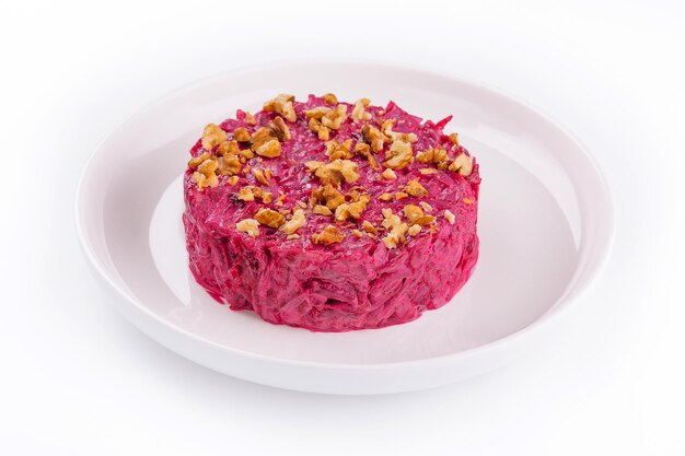 Traditional Beetroot salad with nuts on plate