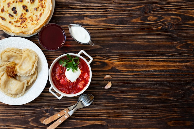 Traditional beetroot with pancakes and baked potatoes