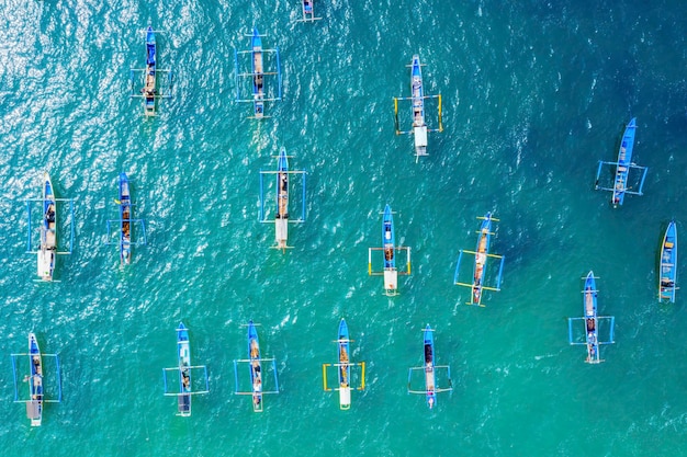 Traditional boats anchoring on turquoise water