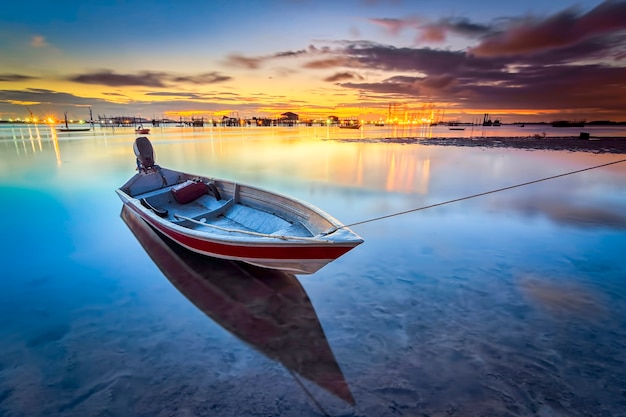 Traditional boats fishing  a beautiful sunset in the fishing village