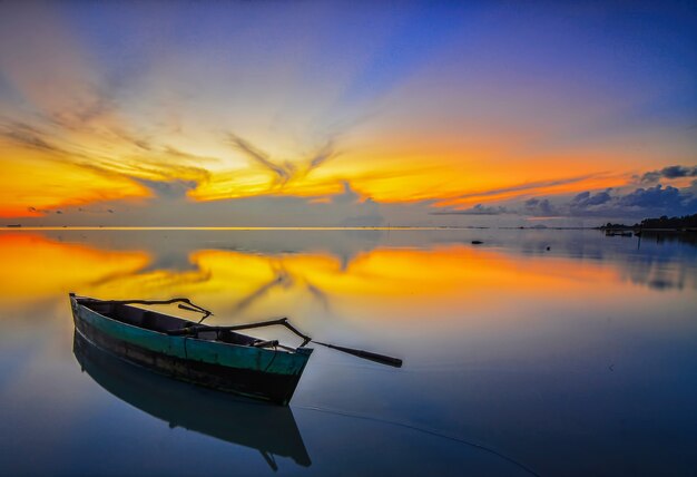 Traditional boats in sunset