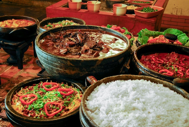 Traditional Brazilian feijoada with cabbage and rice