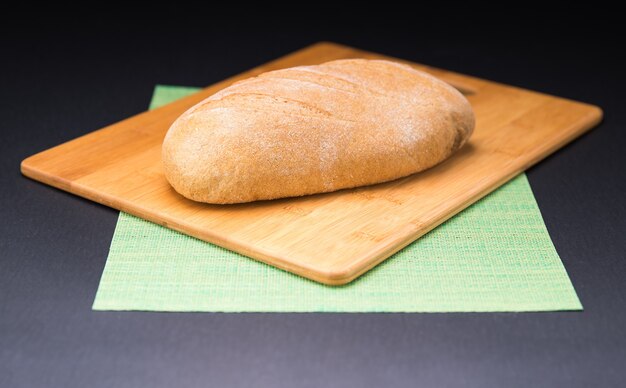 Traditional bread on cooking board