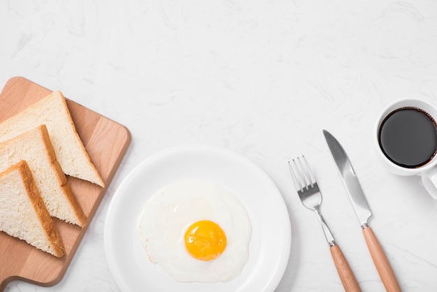 Traditional breakfast with fried eggs on a plate