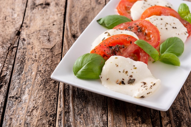 Traditional caprese salad on a white plate