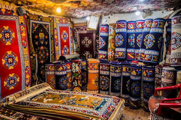 Traditional carpet shop on the market in leh city, ladakh, india