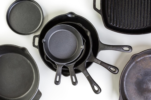 Traditional cast iron skillet on a white background.