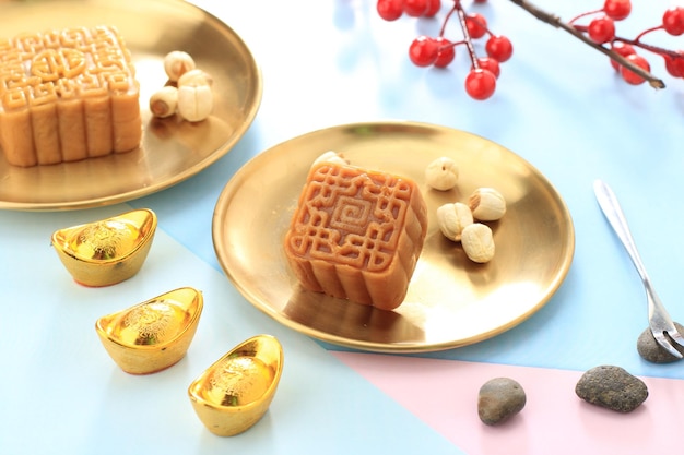 Traditional Chinese Mid Autumn Festival Traditional Mooncake on Colorful Table