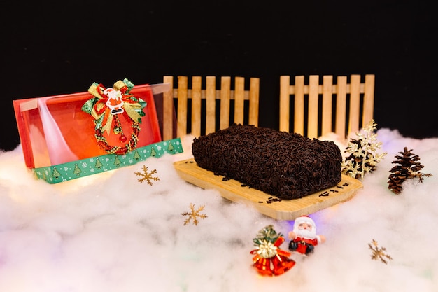 Traditional Christmas cake in festive background