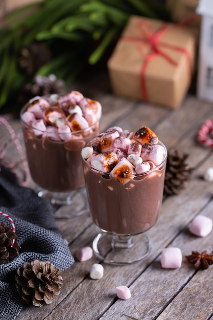 Traditional christmas drink hot cocoa chocolate with roasted marshmallows