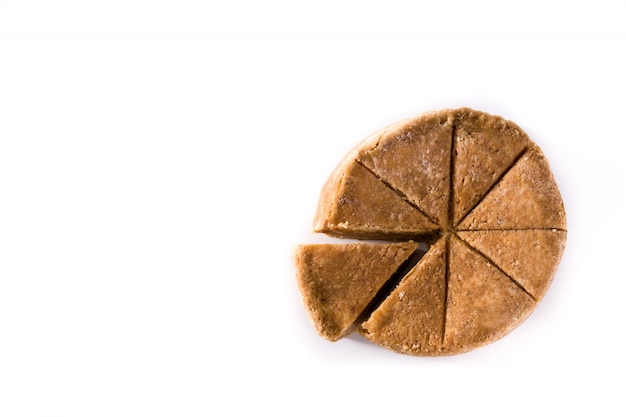 Traditional Christmas marzipan slice on white