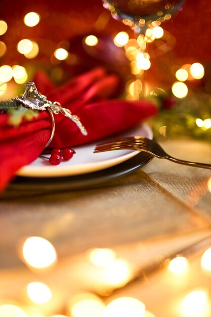 Traditional Christmas table place setting. Holidays background.