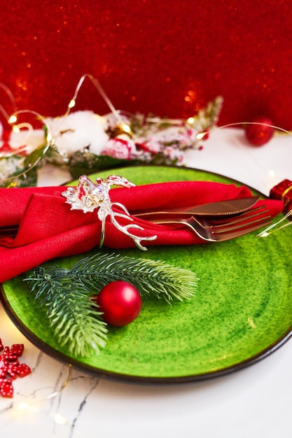 Traditional Christmas table place setting