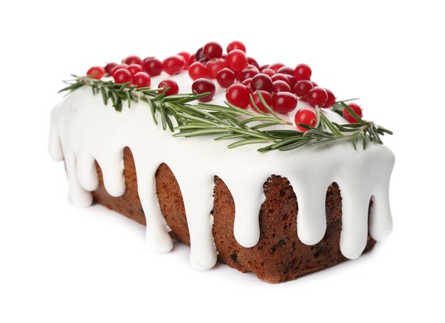 Traditional classic Christmas cake decorated with cranberries and rosemary isolated on white