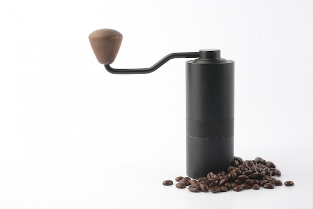 Traditional coffee grinder with coffee beans